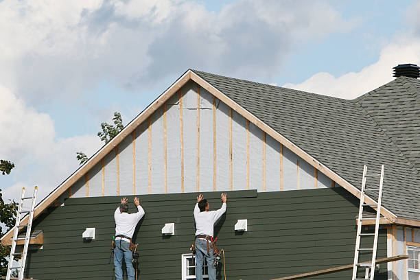 Professional Emergency Siding Repair technician working in Street, MD